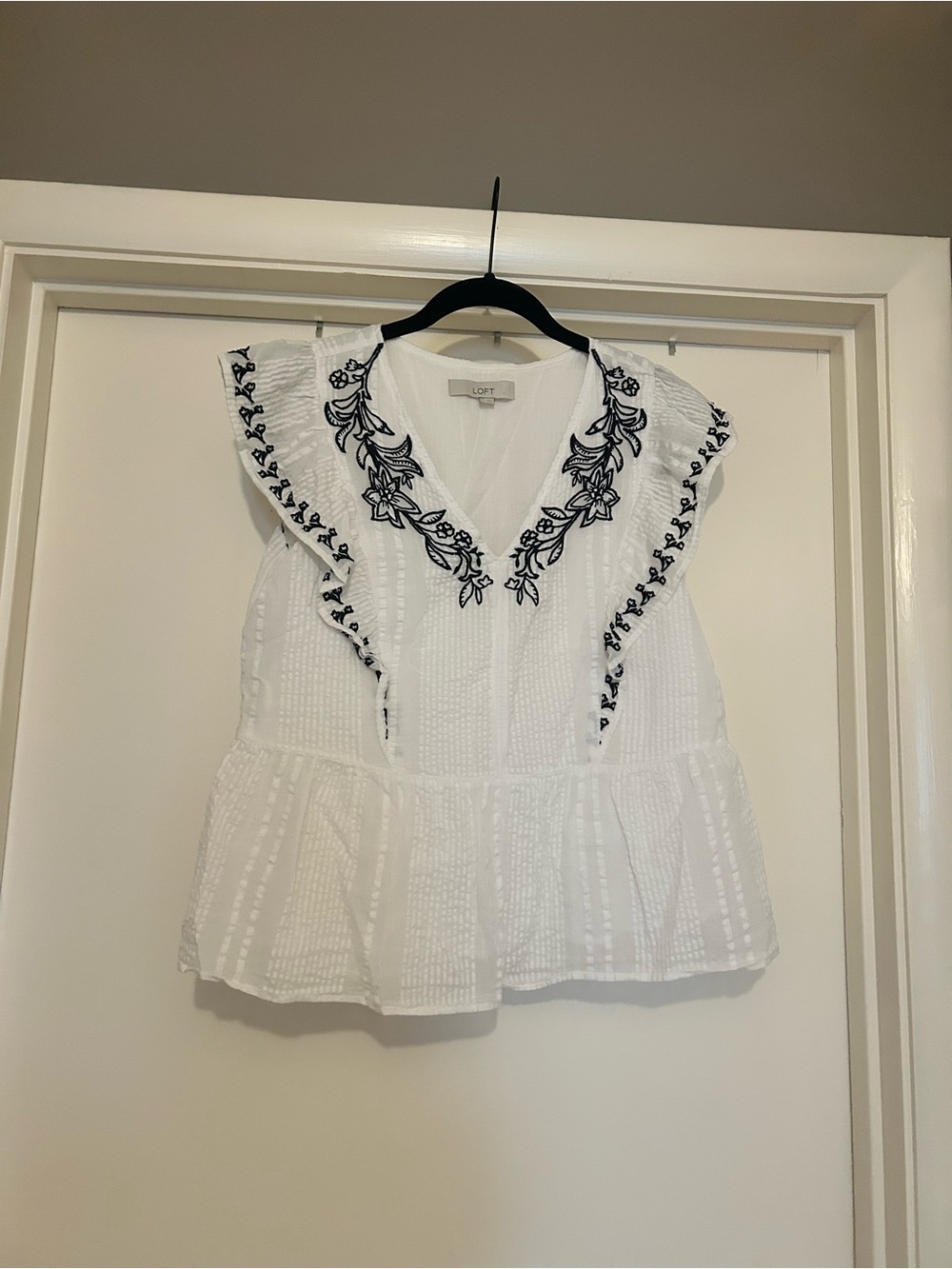 LOFT White Ruffled V-Neck Blouse with Black Floral Trim
